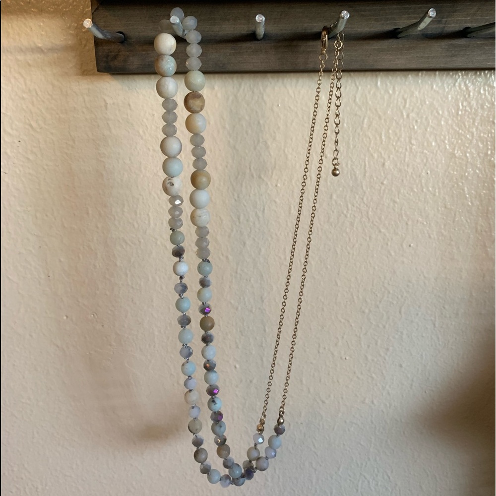 Multi-natural colored long beaded necklace.